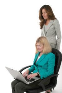 Two Business Women Working On Laptop 14